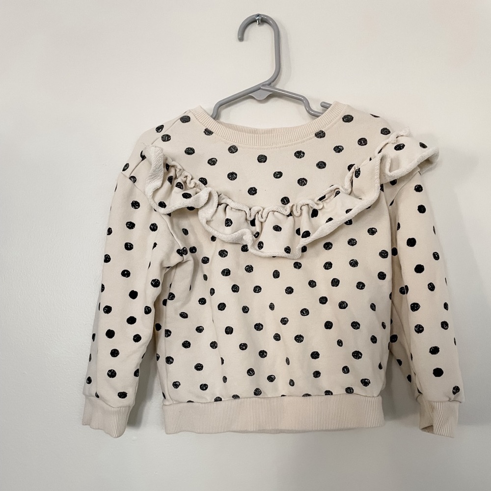 White with black polka dots ruffled sweatshirt. Art Class size 4T.